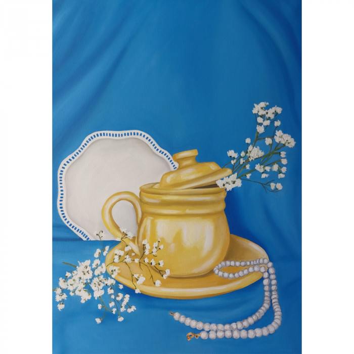 Teiera gialla e perle